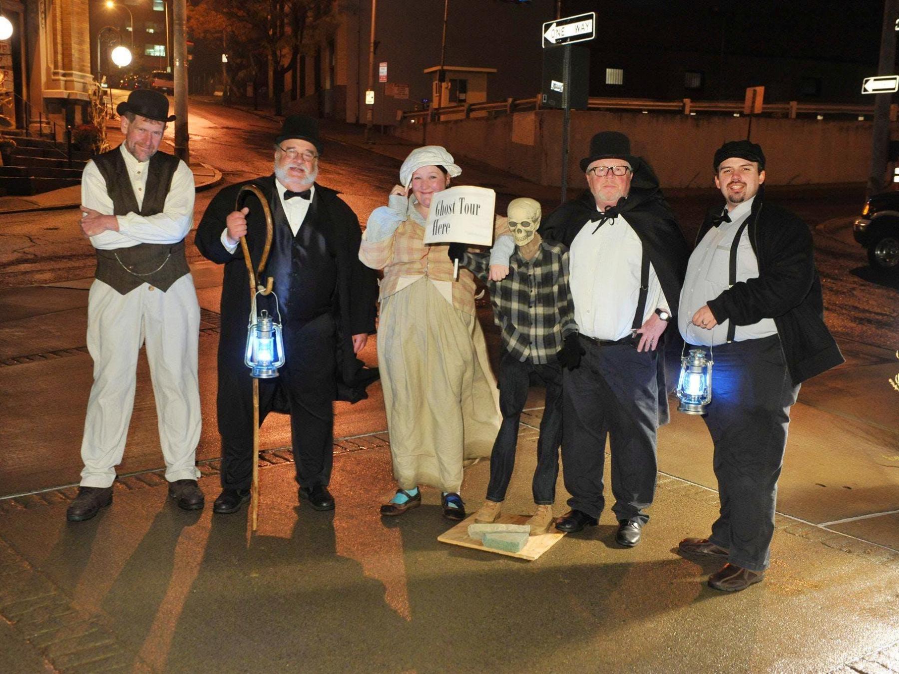 a group of people posing for the camera