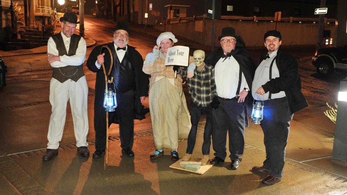 a group of people posing for the camera